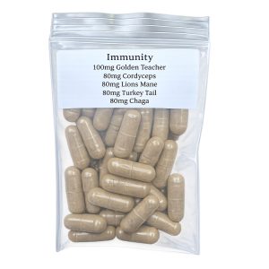 Immunity microdose capsules containing Golden Teacher, Cordyceps, Lions Mane, Turkey Tail, Reishi, and Chaga mushroom blend